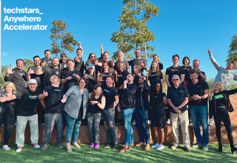 The Techstars Anywhere 2024 cohort participants pose for a group photo during their kickoff meetup in San Diego, California.